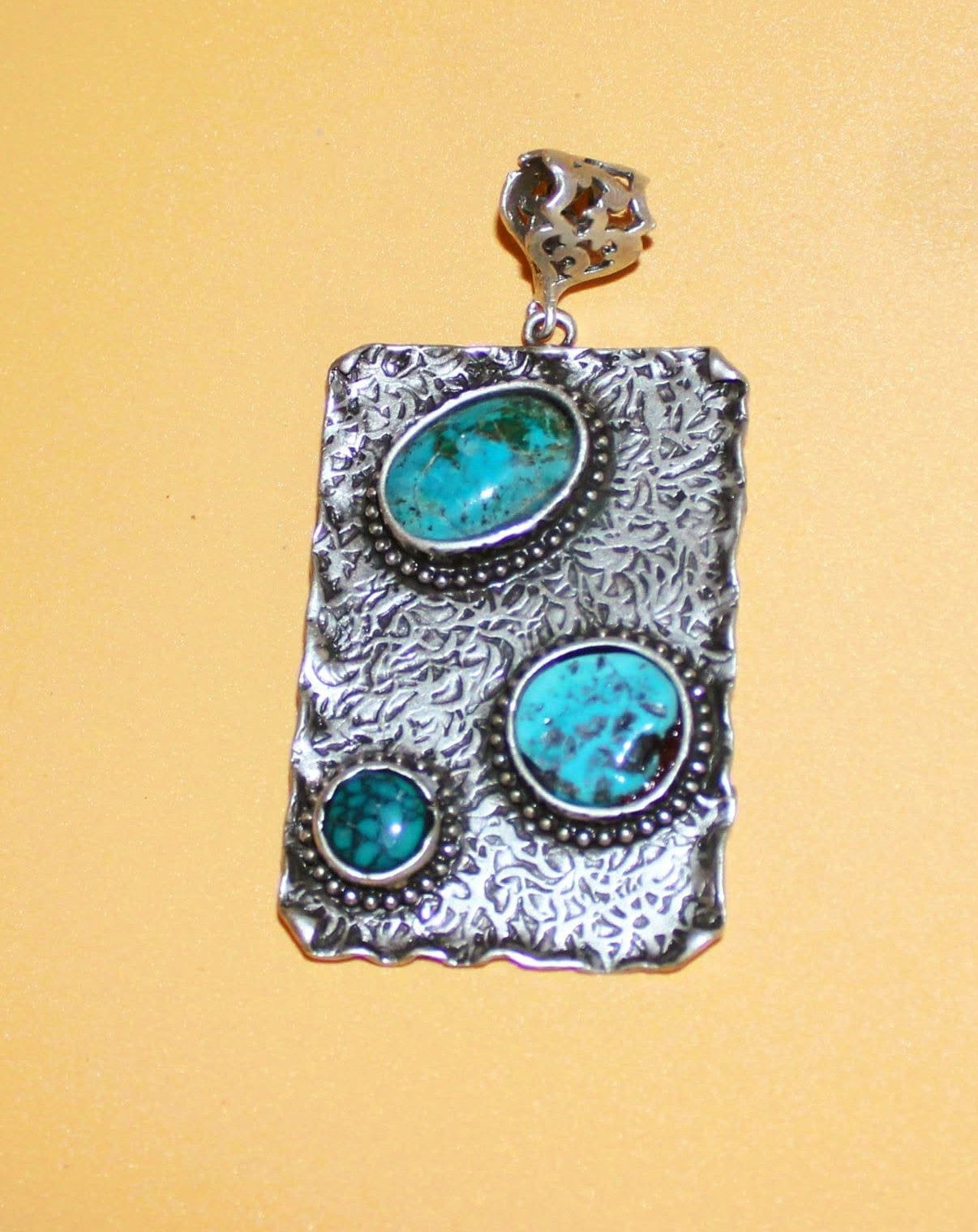 Triple Turquoise Gemstones in a hammered bezel frame (#113)