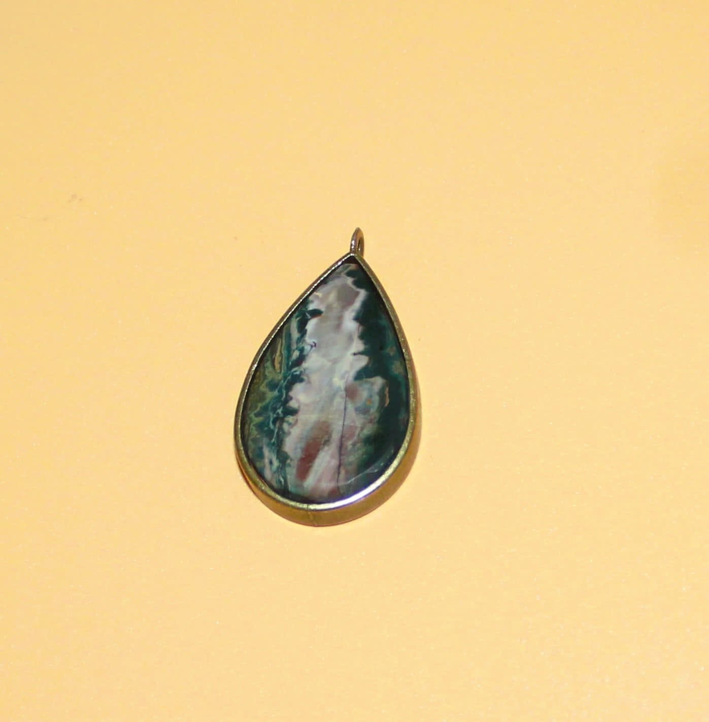 Idaho Sunset Jasper Gemstone in a brass teardrop setting (#106)